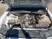 ✅ 2014 Dodge Charger Police • VIN: 2C3CDXAT2EH362342 • Lot: 86846695. Listed on Copart with 167,142 mi. Free auction sales archive from the USA and detailed vehicle history report at DreamBid. Image 11.