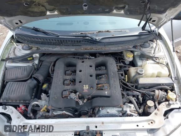 ✅ 2001 Chrysler 300M M • VIN: 2C3AE66G81H575610 • Lot: 41933740. Listed on IAAI with 102,778 mi. Free auction sales archive from the USA and detailed vehicle history report at DreamBid. Image 10.