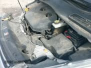 ✅ 2014 Ford Escape Titanium • VIN: 1FMCU0J91EUB97710 • Lot: 42261415. Wystawiony na IAAI z przebiegiem 128 286 mil. Bezpłatny archiwum sprzedaży aukcyjnych z USA i szczegółowy raport historii pojazdu na DreamBid. Zdjęcie 13.