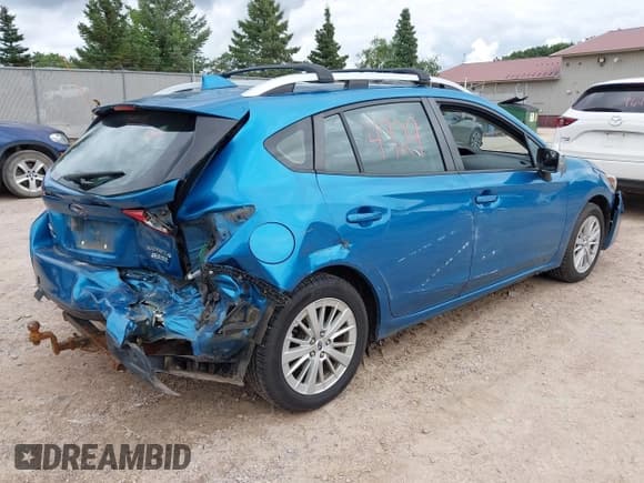 ✅ 2017 Subaru Impreza Premium • VIN: 4S3GTAD63H3742445 • Lot: 43034929. Listed on IAAI with 127,296 mi. Free auction sales archive from the USA and detailed vehicle history report at DreamBid. Image 4.