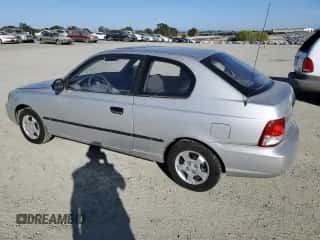 2002 Hyundai Accent with VIN KMHCF35G62U203274, listed as a Copart auction lot 77047834 with 90,442 mi miles and Salvage title. Bid and sale history available at DreamBid. Image 2.