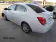 2014 Chevrolet Sonic LT with VIN 1G1JC5SG9E4127762, listed as a IAAI auction lot 43521388 with 128,333 mi miles and . Bid and sale history available at DreamBid. Image 3.