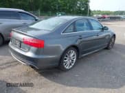 ✅ 2014 Audi A6 Prestige • VIN: WAUHGAFC0EN048045 • Lot: 42582288. Listed on IAAI with 150,114 mi. Free auction sales archive from the USA and detailed vehicle history report at DreamBid. Image 4.