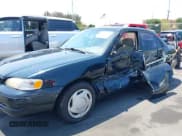 ✅ 1999 Toyota Corolla VE • VIN: 1NXBR12E4XZ251809 • Lot: 42910359. Listed on IAAI with 150,200 mi. Free auction sales archive from the USA and detailed vehicle history report at DreamBid. Image 6.