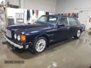 ✅ 1998 Bentley Brooklands • VIN: SCBZF19CXWCX66398 • Lot: 42124565. Listed on Copart with Not provided. Free auction sales archive from the USA and detailed vehicle history report at DreamBid. Image 1.