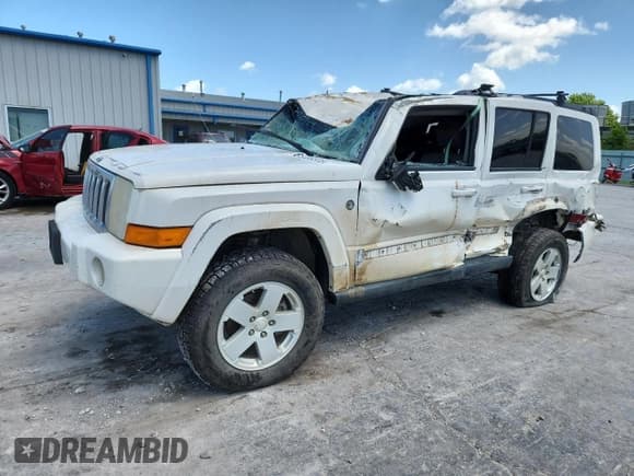 ✅ 2007 Jeep Commander Sport • VIN: 1J8HG48P77C671237 • Lot: 61435535. Listed on Copart with 221,103 mi. Free auction sales archive from the USA and detailed vehicle history report at DreamBid. Image 1.