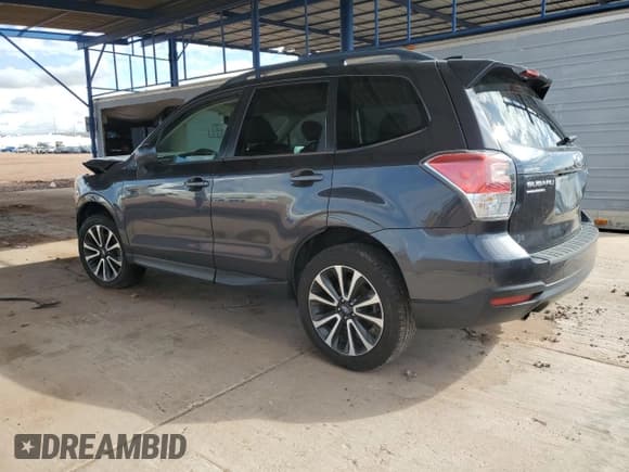 ✅ 2018 Subaru Forester Premium • VIN: JF2SJGEC5JH585423 • Lot: 85878745. Listed on Copart with 77,072 mi. Free auction sales archive from the USA and detailed vehicle history report at DreamBid. Image 2.