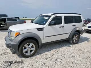 2007 Dodge Nitro SXT with VIN 1D8GT28K67W597011, listed as a Copart auction lot 69780615 with 144,494 mi miles and Salvage title. Bid and sale history available at DreamBid. Image 1.