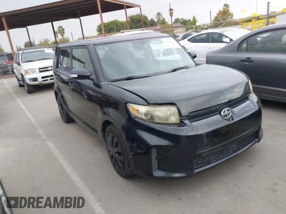 ✅ 2012 Scion xB • VIN: JTLZE4FE4CJ013209 • Lot: 43336960. Listed on IAAI with 129,734 mi. Free auction sales archive from the USA and detailed vehicle history report at DreamBid. Image 1.