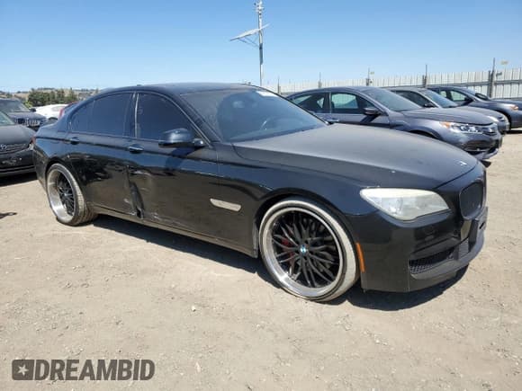 ✅ 2013 BMW 7 Series 750i • VIN: WBAYA8C59DD227527 • Lot: 64618025. Listed on Copart with 96,049 mi. Free auction sales archive from the USA and detailed vehicle history report at DreamBid. Image 4.