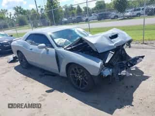 2021 Dodge Challenger GT z VIN 2C3CDZJG6MH600268, wystawiony jako IAAI lot #43091969 z przebiegiem 64 087 mil mil oraz . Historia ofert i sprzedaży dostępna na DreamBid. Obrazek 1.