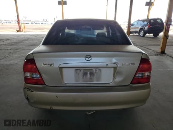 ✅ 2001 Mazda Protege LX • VIN: JM1BJ225410449919 • Lot: 51674295. Wystawiony na Copart z przebiegiem 148 914 mil. Bezpłatny archiwum sprzedaży aukcyjnych z USA i szczegółowy raport historii pojazdu na DreamBid. Zdjęcie 6.