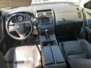 ✅ 2015 Mazda CX-9 Touring • VIN: JM3TB2CA8F0452186 • Lot: 71797715. Wystawiony na Copart z przebiegiem 152 637 mil. Bezpłatny archiwum sprzedaży aukcyjnych z USA i szczegółowy raport historii pojazdu na DreamBid. Zdjęcie 8.