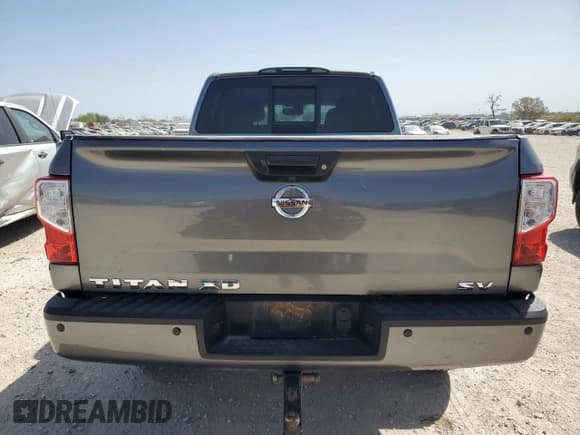 ✅ 2017 Nissan Titan SV • VIN: 1N6AA1F25HN556025 • Лот: 50098995. Опубликован ранее на Copart с пробегом 161 927 миль. Бесплатный доступ к архиву аукционных продаж из США и подробный отчёт об истории автомобиля на DreamBid. Изображение 6.